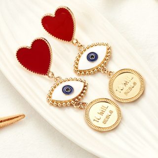 Arete moneda y corazón
