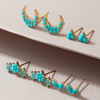 Juego de aretes