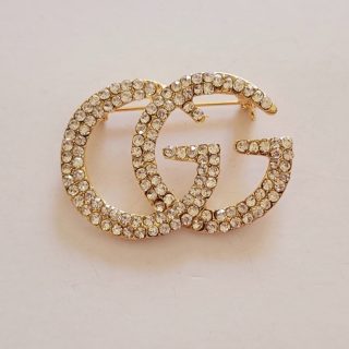Broche GG