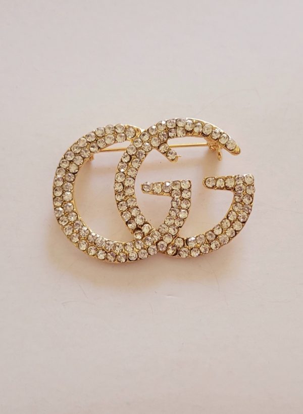 Broche GG