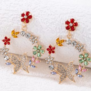 Arete flor y mariposa