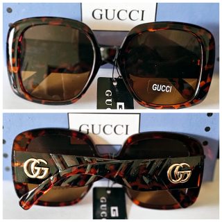 Lente de sol G-UCCI